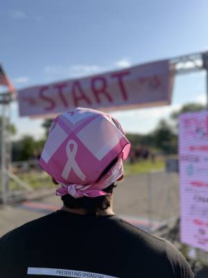 Participant approaches the starting line for annual Pink 5K in support of breast cancer awareness